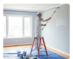 Painter painting a wall